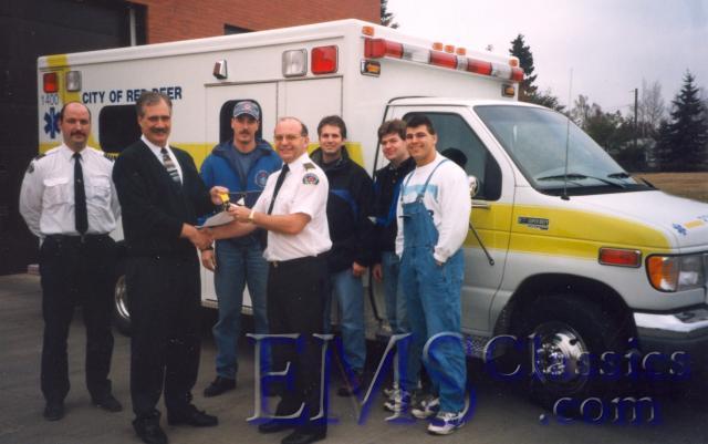 02880MA011997McCoyMillerFord,DeputyTedHickeyChiefGordStewart,RedDeerAB.jpg