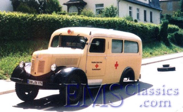 1940sRedCrossparadeofantiqueambulances,Germany.JPG