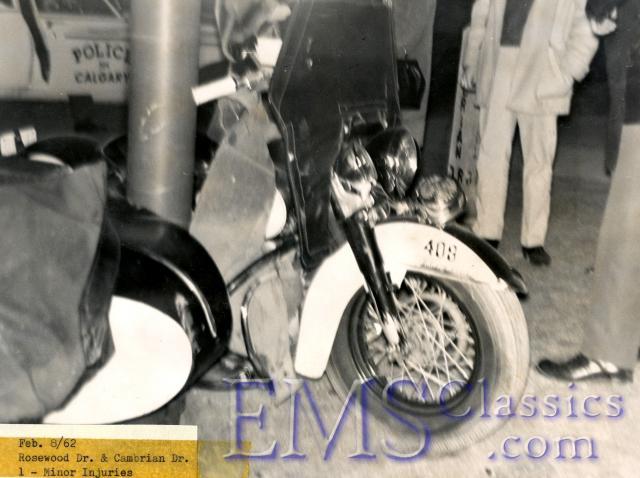 1962Policemotorcyclesidecarwrappedaroundstreetlight,CalgaryAB,photoStuPaterson.jpg