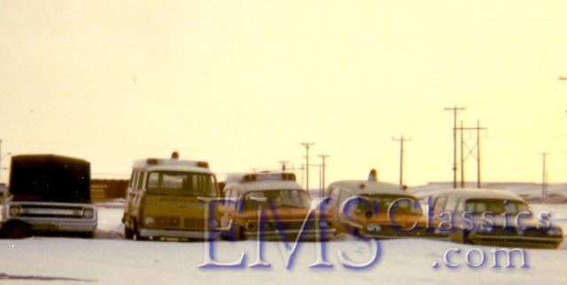 1971CityofCalgaryAB,graveyardofpreviouslyprivateambulances.jpg