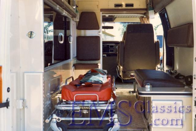 AmbucraftFordwithorangestripesidewindow,1988photo.jpg